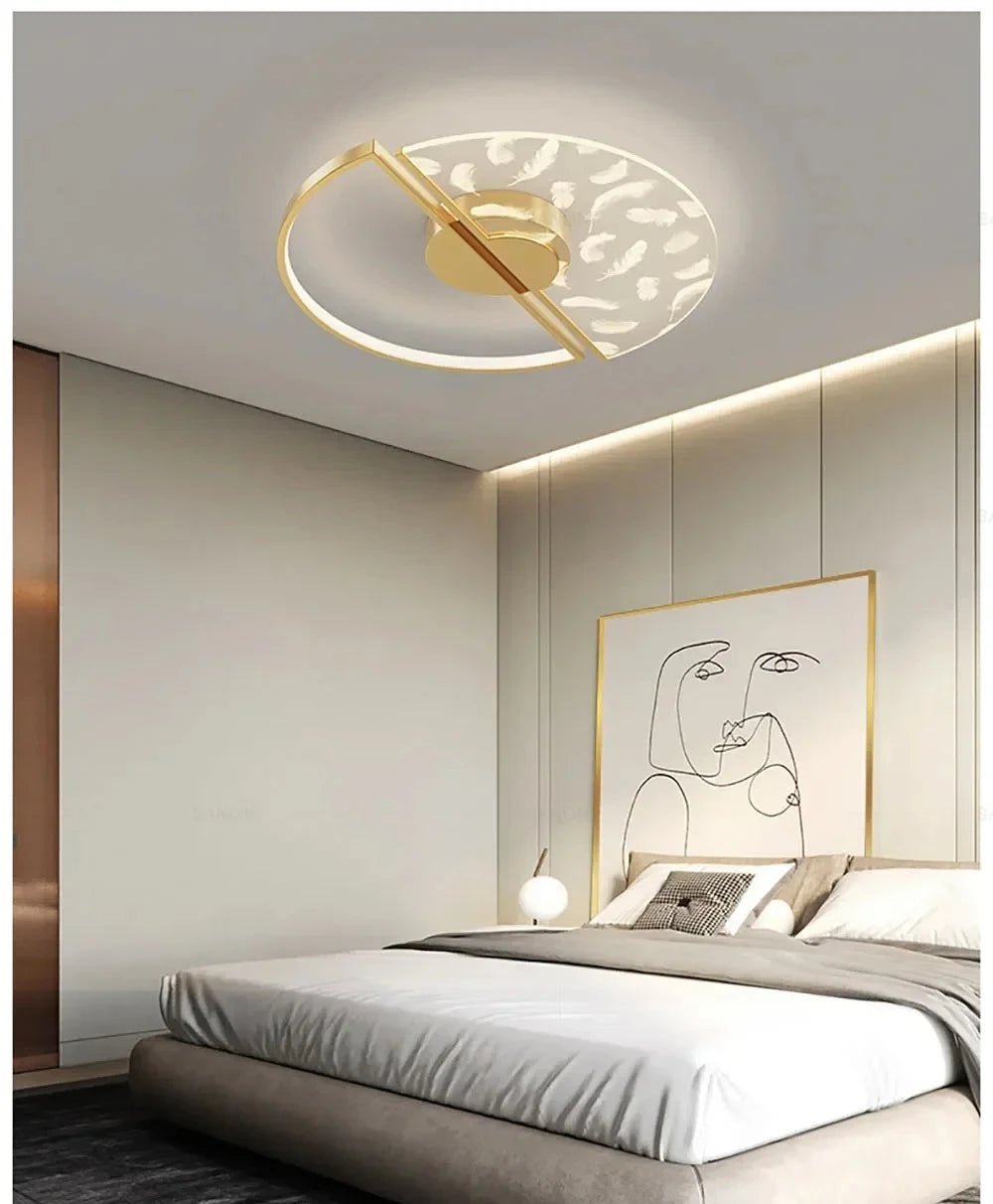 Modern bedroom with a ceiling light fixture and abstract wall art.