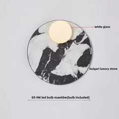 Decorative light fixture with white glass shade and Bulgari luxury stone base on a gray background.