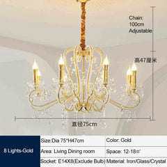 Gold chandelier with crystal accents and dimensions on a neutral background
