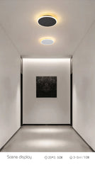 Modern Black Round LED Wall Sconce with Subtle Halo Light Effect