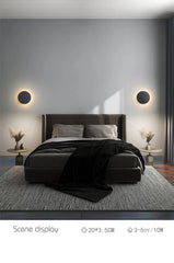 Modern Black Round LED Wall Sconce with Subtle Halo Light Effect