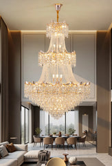 Luxurious crystal chandelier hanging in a modern living room.