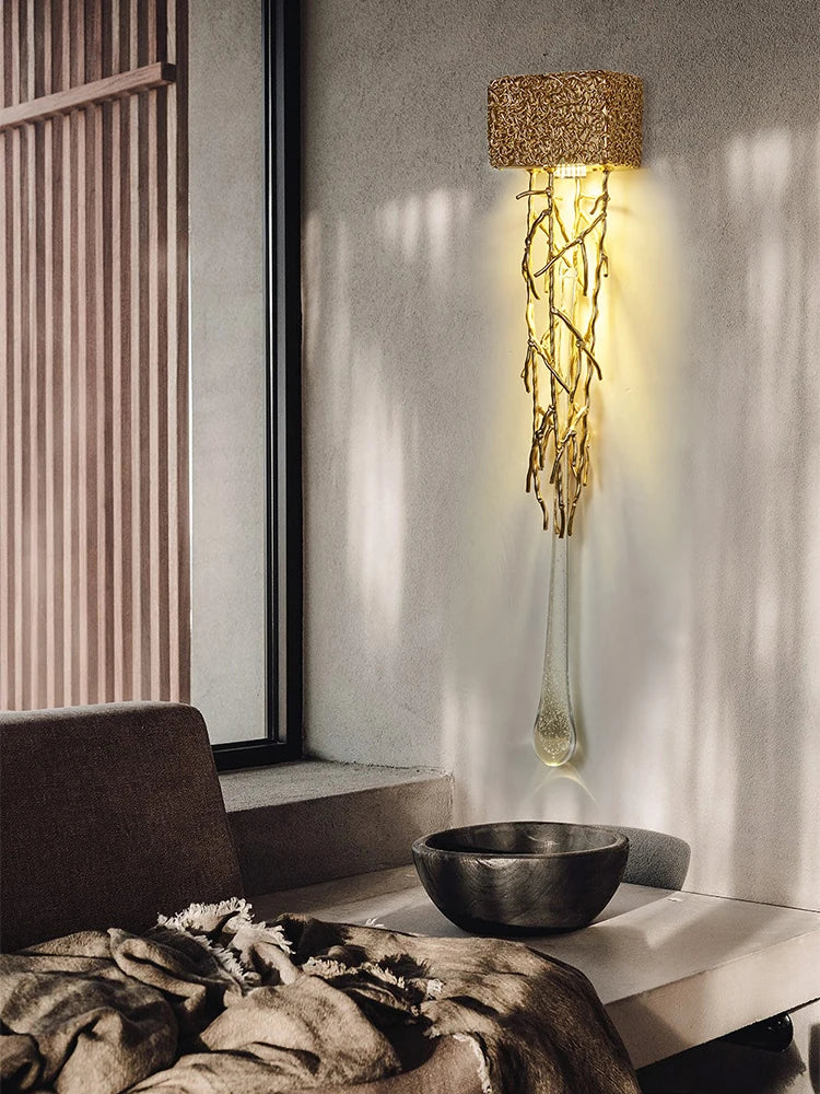 Decorative floor lamp with natural branch design in a modern interior setting.
