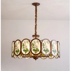 Bronze Chandelier with Frosted Glass and Green Leaf Floral Accents