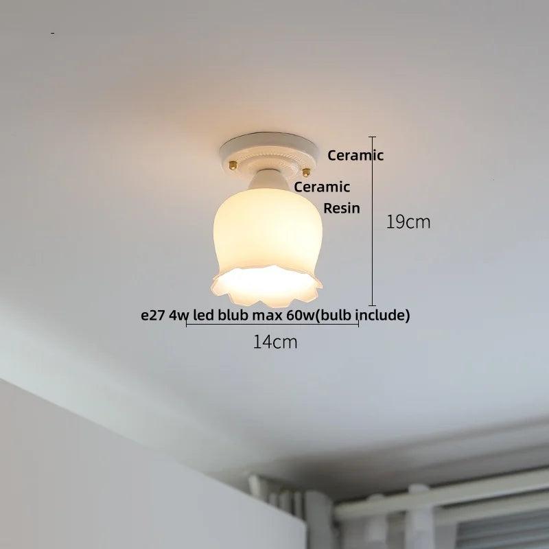 Ceiling light fixture with measurements on a white ceiling