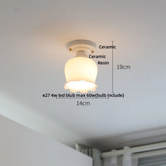 Ceiling light fixture with measurements on a white ceiling