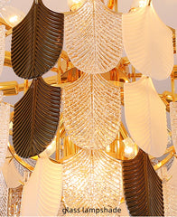 Decorative chandelier with leaf-shaped glass lampshades in gold and black.