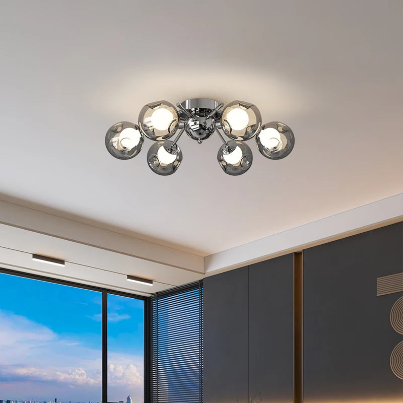 View of a polished chrome starburst chandelier from a slightly different angle, highlighting its multi-directional arms.