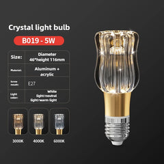 Crystal light bulb with specifications on a dark background