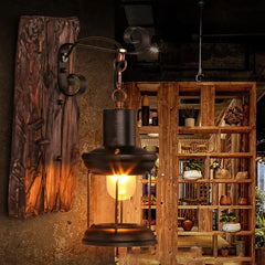 Black Iron Lantern Wall Sconce with Rustic Wood Backplate