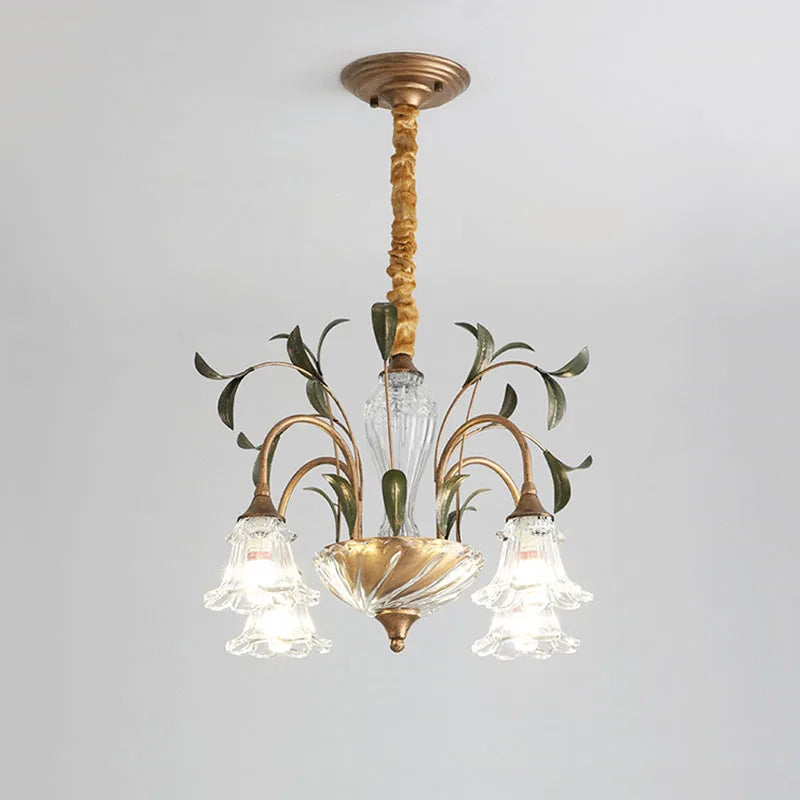 Gold floral crystal semi-flush chandelier against a white ceiling