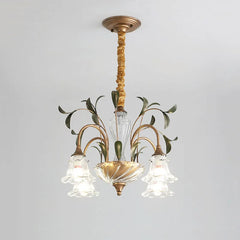 Gold floral crystal semi-flush chandelier against a white ceiling