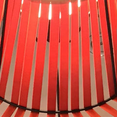 Close-up of a red and white striped fabric with a black border.