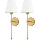 Two brushed gold wall sconces with white fabric shades against a white background.