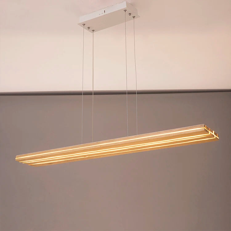 Modern pendant light fixture hanging from a ceiling