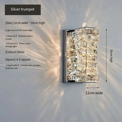 Wall-mounted light fixture with crystal design on a white wall, featuring dimensions and specifications.