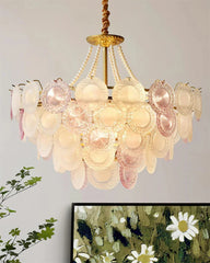 Decorative chandelier with floral design on a light gray background