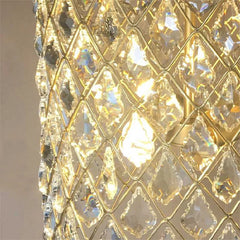 Close-up of a gold and crystal chandelier