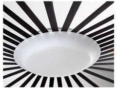 Ceiling light fixture with black and white striped background