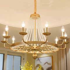 Gold chandelier with crystal accents in a room setting