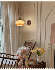 Wood and Brass Arm Wall Sconce with Frosted Glass Shade