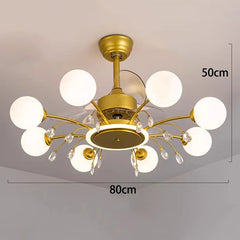 Gold chandelier with white lights on a plain background