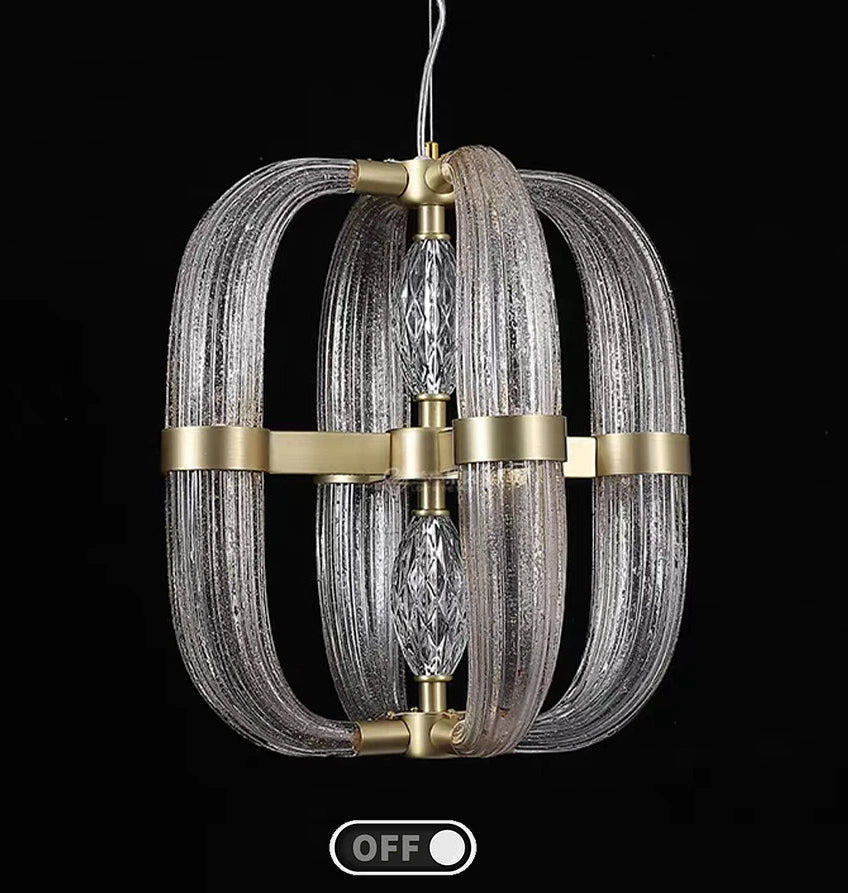Decorative pendant light with gold accents on a black background