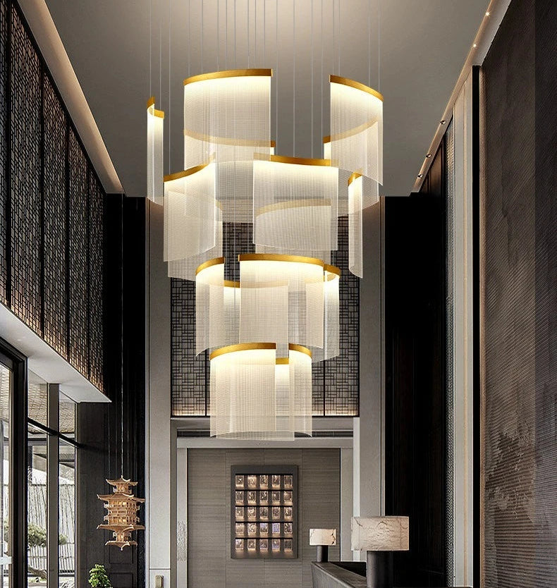 Modern interior with a large chandelier in a stylish room.