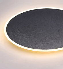 Modern Black Round LED Wall Sconce with Subtle Halo Light Effect