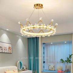 Gold chandelier in a bedroom with light blue curtains and a 'I Love My Bedroom' sign.