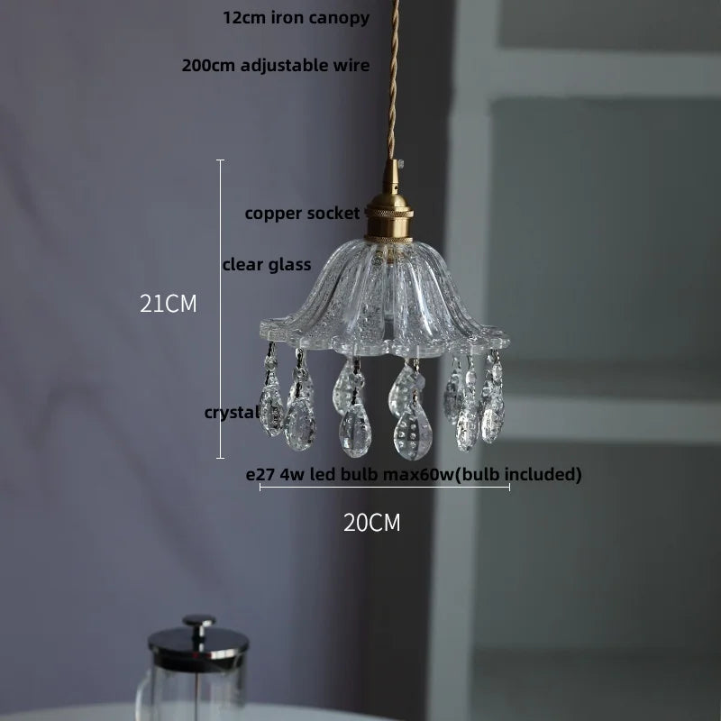 Chandelier with measurements labeled on a plain background