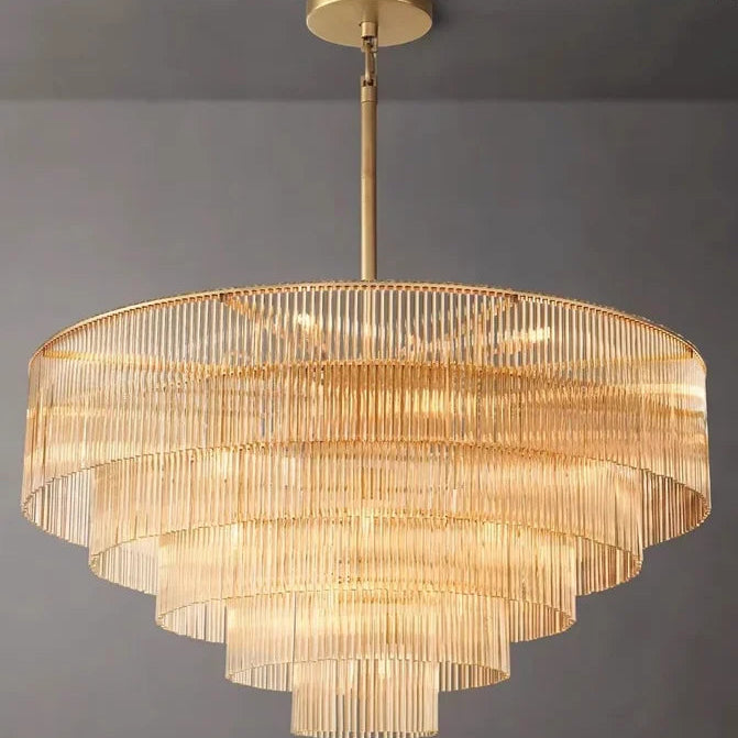 Gold chandelier on a gray background