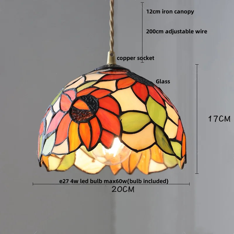 Colorful stained glass pendant light with measurements on a gray background