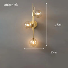 Modern Gold Brass Sconce with Three Frosted Globe Shades