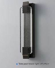 Metallic object with textured sides on a gray background