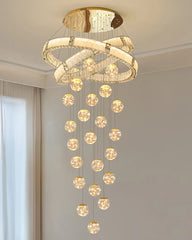 Chandelier with multiple round lights hanging from a ceiling