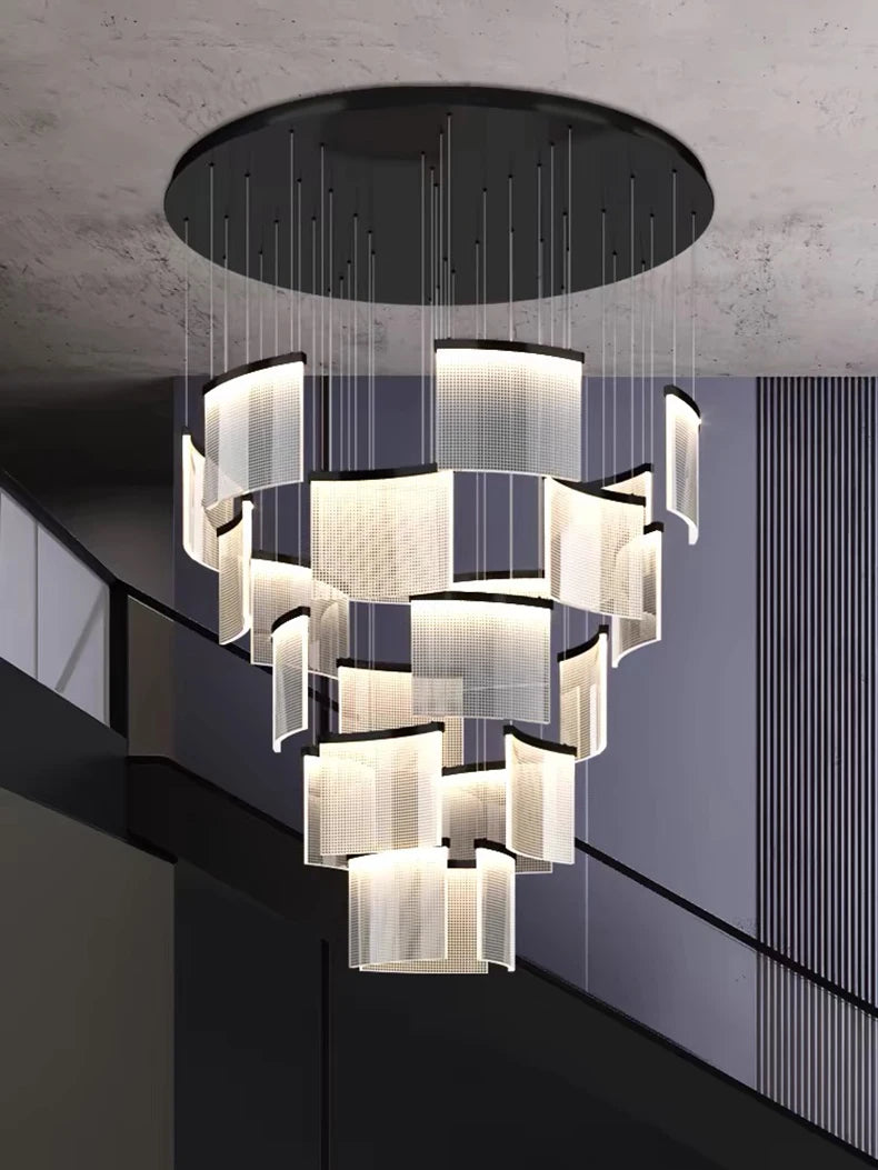 Modern chandelier hanging from a ceiling with a geometric design.