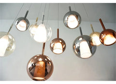 Rose Gold Glass Globe Pendant Light with Polished Metal Frame