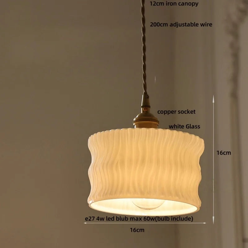 Pendant light with measurements on a plain background