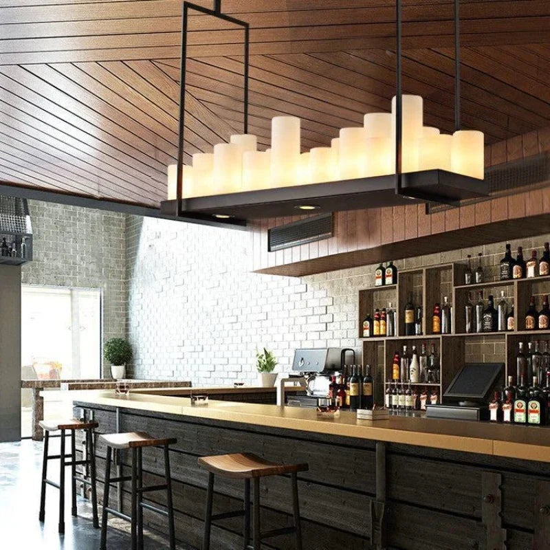 Modern bar interior with wooden ceiling, stools, and shelves with bottles.