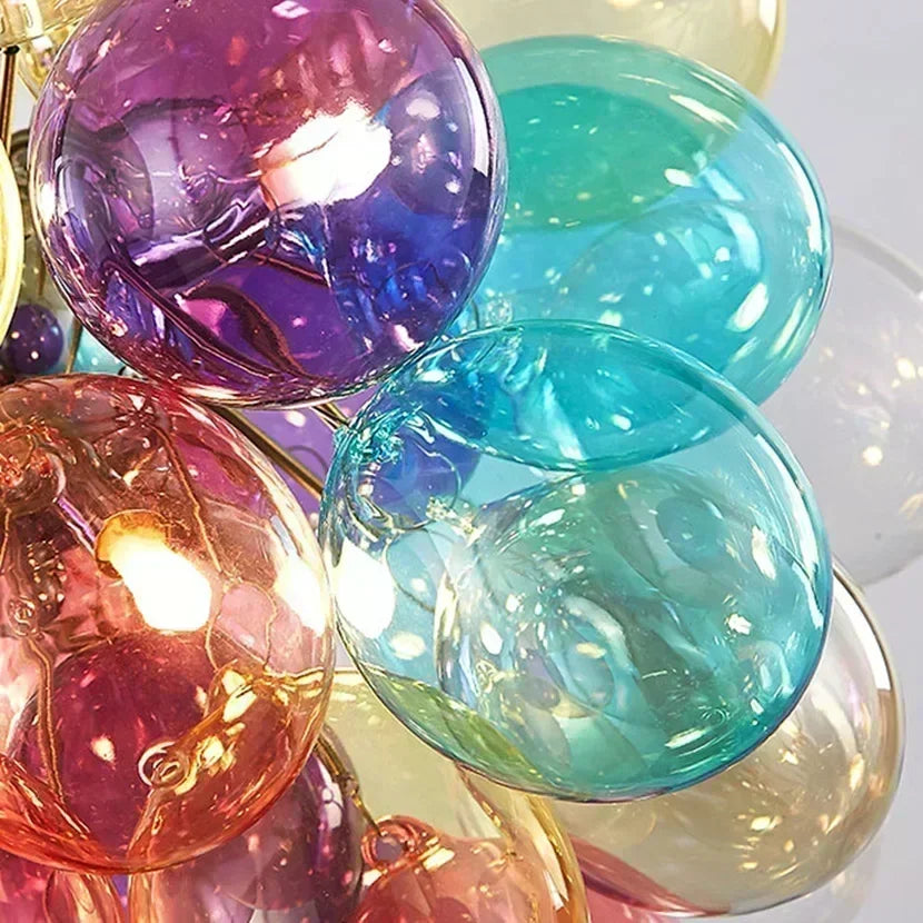 Colorful glass ornaments on a white background