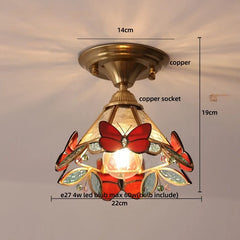Ceiling light fixture with butterfly design and measurements on a neutral background