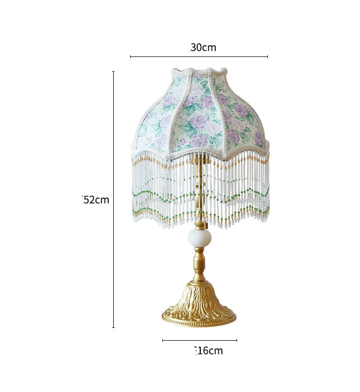 Decorative lamp with floral pattern and measurements on a white background
