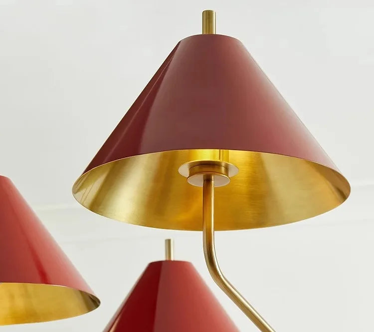 Red and gold lampshades on a white background