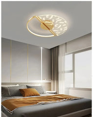 Modern bedroom with a ceiling light fixture