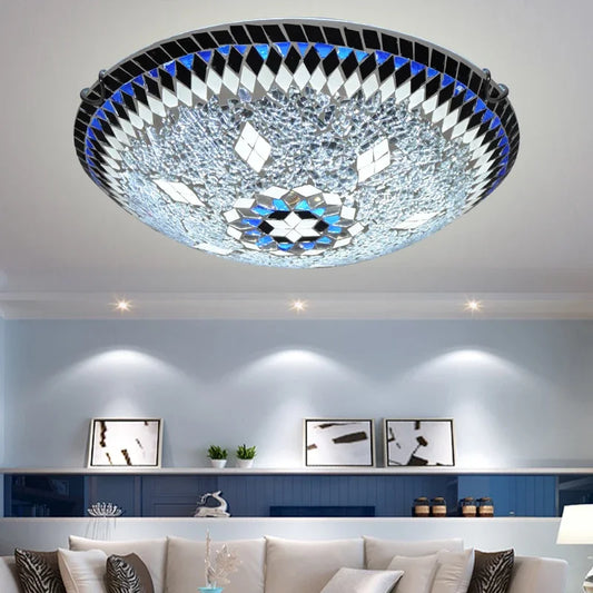 Glass mosaic starburst flush mount ceiling light in a living room setting