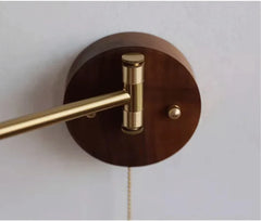 Adjustable Brass Swing Arm Sconce with Natural Wood Cylinder Shade