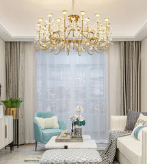 Luxurious living room with a gold chandelier, light blue armchair, and white sofa.