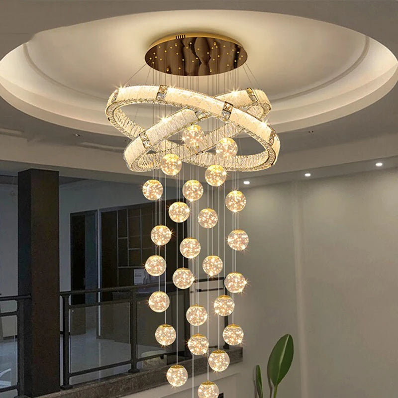 Modern crystal pendant light fixture creating a statement in an open interior