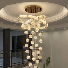Modern crystal pendant light fixture creating a statement in an open interior